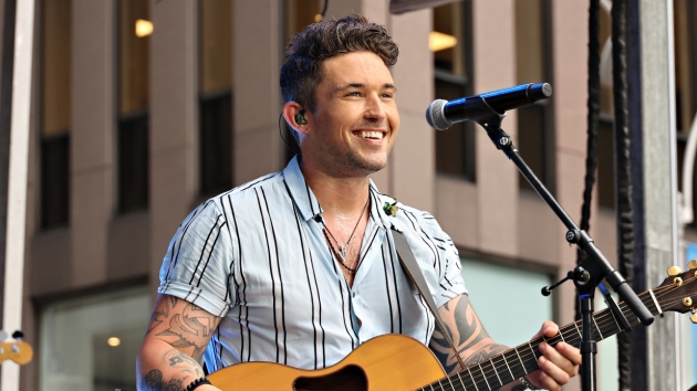 Getty_MichaelRayBlueStrippedShirt