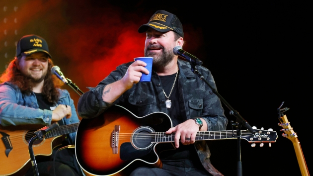 Getty Leebriceonstageguitarandjacket