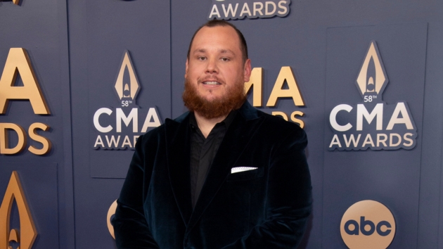 M Lukecombs2024cmaawardsredcarpetdisneyscottkirkland