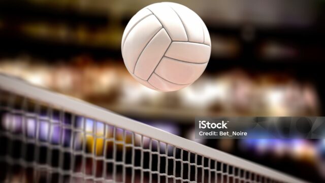 Volleyball ball and net in voleyball arena during a match. 3d illustration